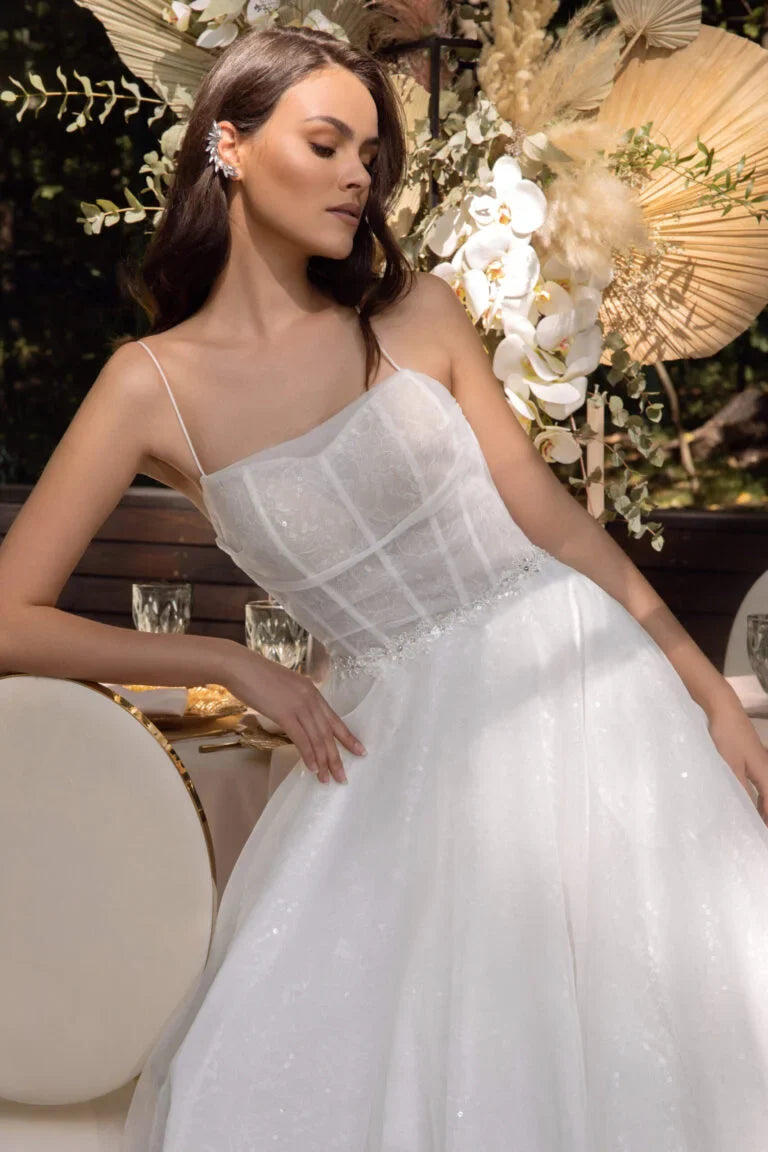 Timeless A-Line Wedding Dress with Spaghetti Straps, Straight Across Neckline, and Elegant Button Detailing