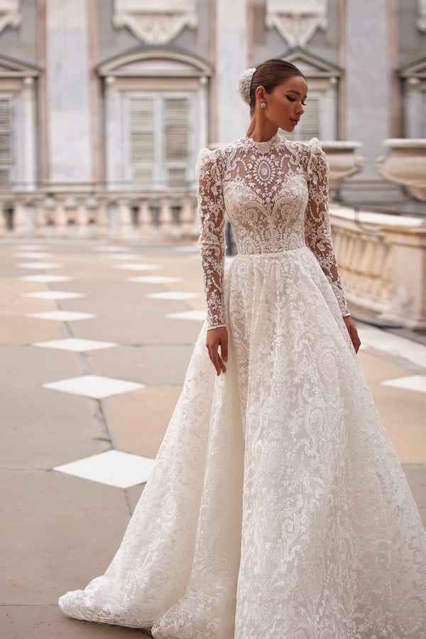 Elegant A-Line Wedding Dress with Long Sleeves, Halter Neckline, and Button Embellishments