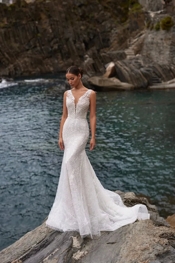 Glamorous Mermaid Wedding Dress with Sleeveless Design, V-Neckline, and Exquisite Embroidery Embellishments