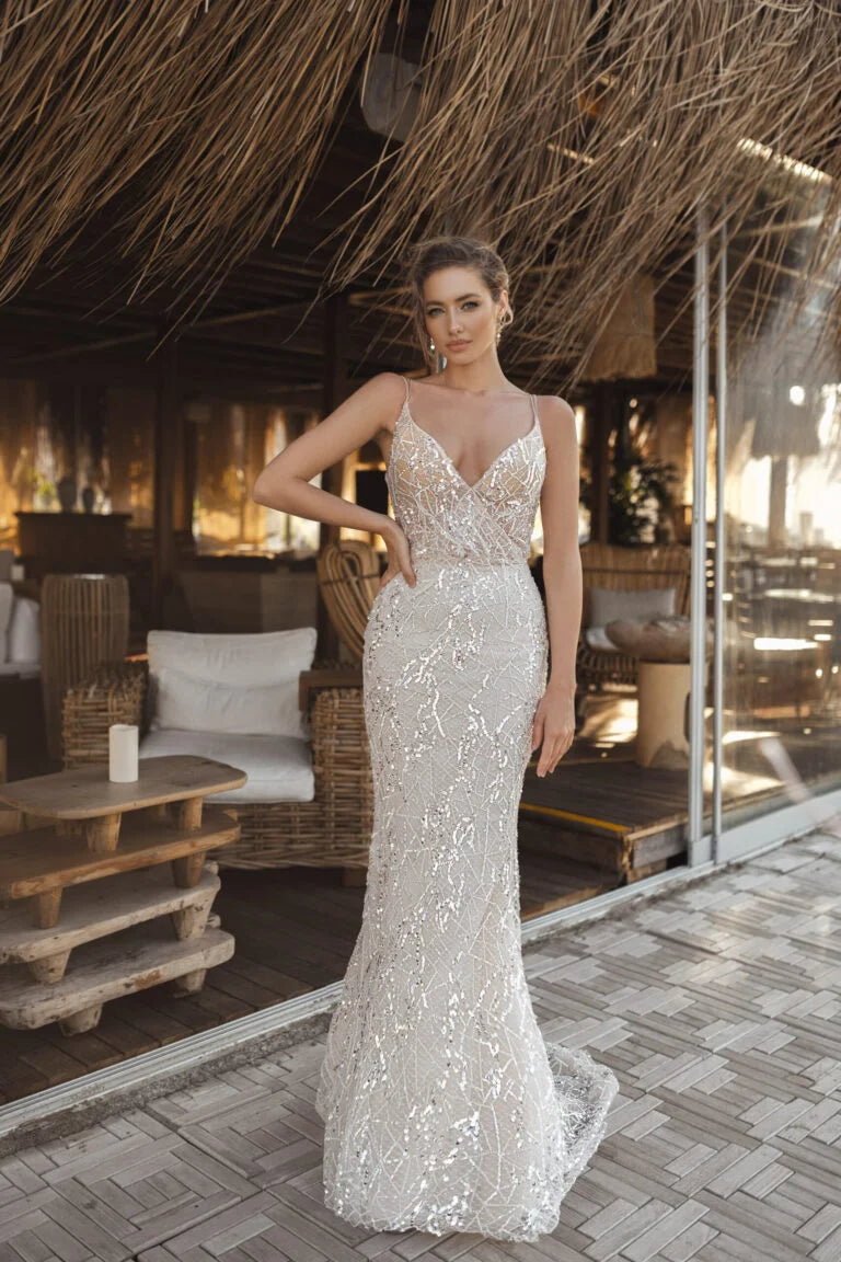 Modern Mermaid Wedding Dress with Spaghetti Straps, V-Neckline, Glitter Embellishments, and Natural Waistline